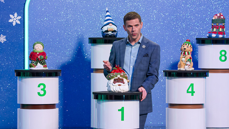 "Is It Cake" host Mikey Day shows off the contestants' entries