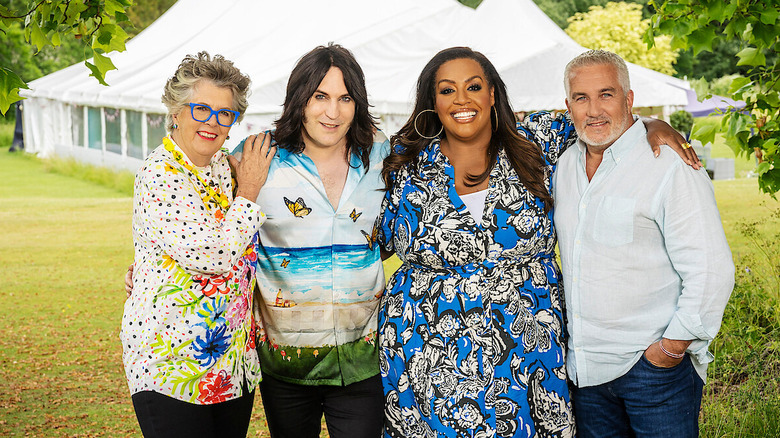 A portrait of the four judges of The Great British Baking Show