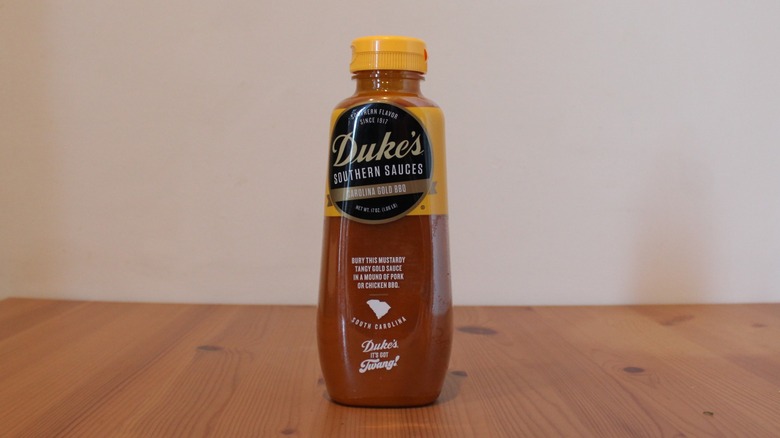 Duke's Carolina Gold BBQ Sauce on a wooden table