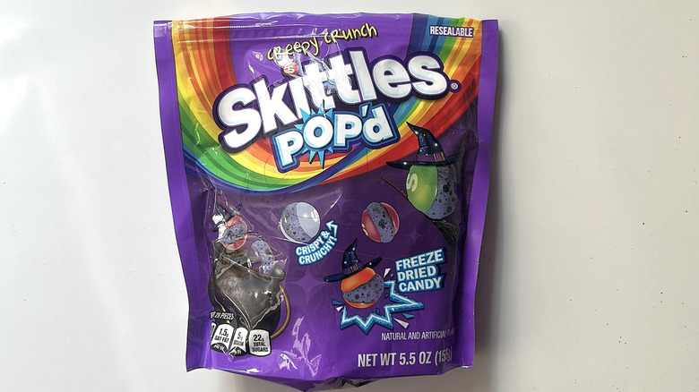 Skittles Pop'd Creepy Crunch in a purple bag