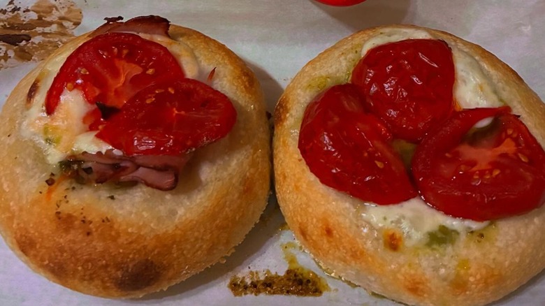 two Basil pesto Mozzarella Pizza bialy bagels at The Sourdough Bagel