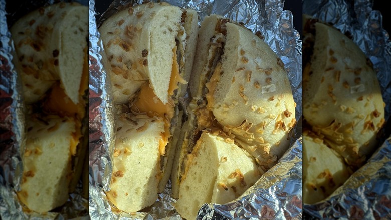 bagel sandwich with cheese on garlic bagel in tin foil at Jersey Bagel Brothers