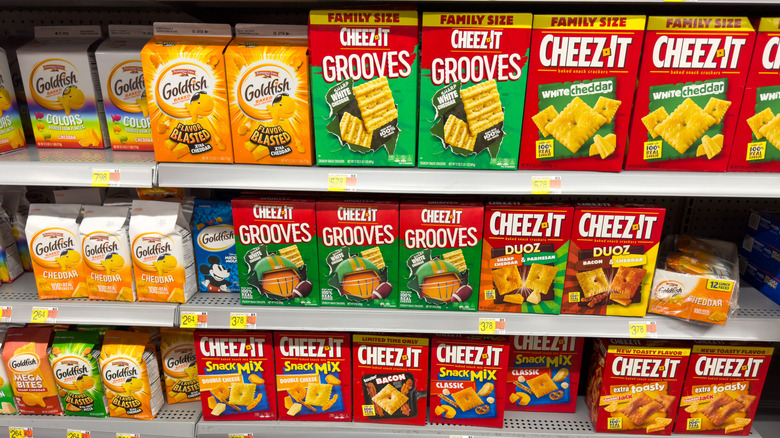 Boxes of Cheez-Its and Goldfish on grocery store shelf