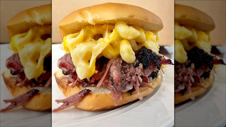 Brisket sandwich topped with smoked mac and cheese from PICKaBOB Grill and BBQ