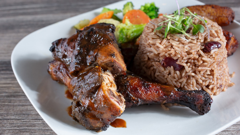 Jerk chicken with rice, vegetables and plantains