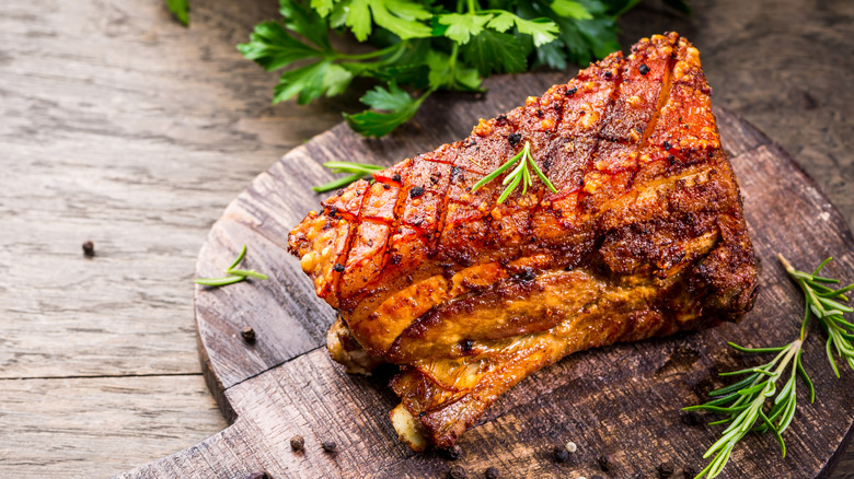 roasted pork belly on platter
