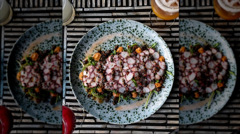 an overhead shot of a beautifully composed octopus dish at Aguasanta
