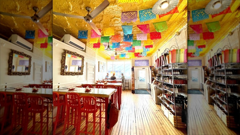 Terlingua's dining room bathed in natural light beneath a yellow ceiling