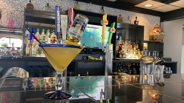 Los Amigos interior bar featuring a giant margarita with a corona in it