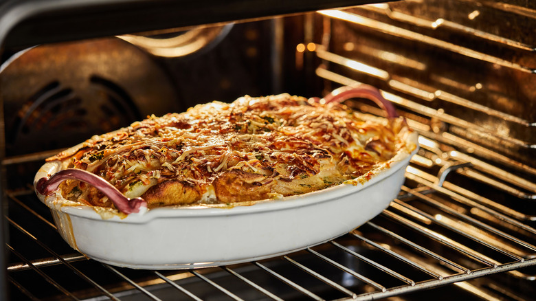 A casserole baking in an oven.