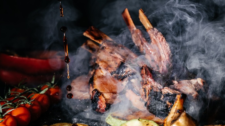 rack of lamb on smoky grill