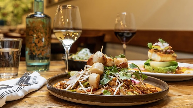 Scallop pad thai and a glass of wine from Crush Wine Bistro