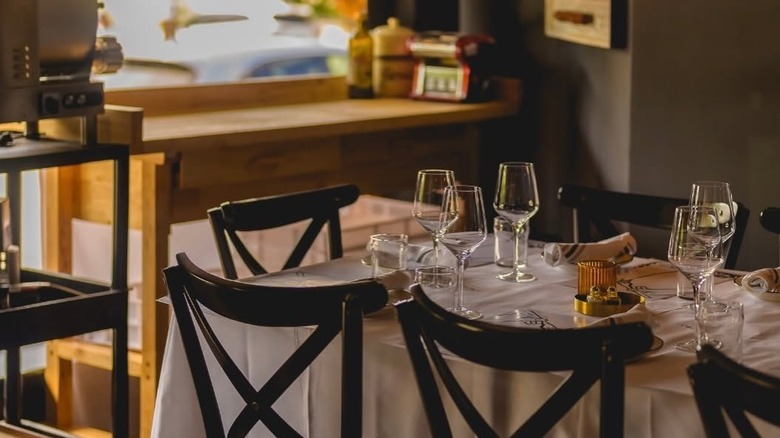 Table at Ciao Ciao with white tablecloth and wine glasses