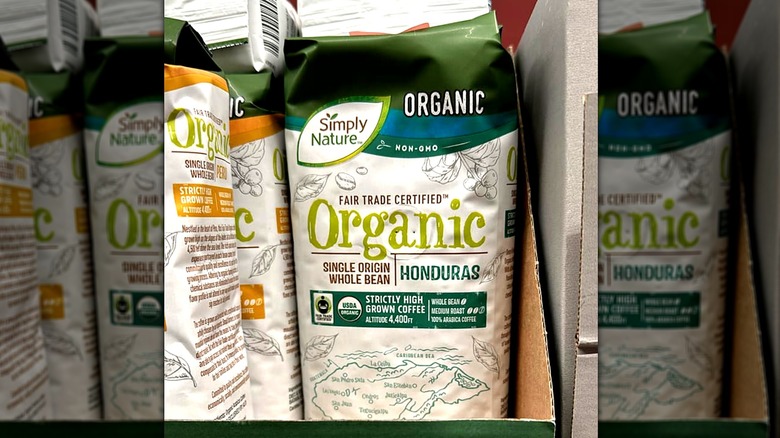 Bags of Simply Nature whole bean coffee on display at Aldi