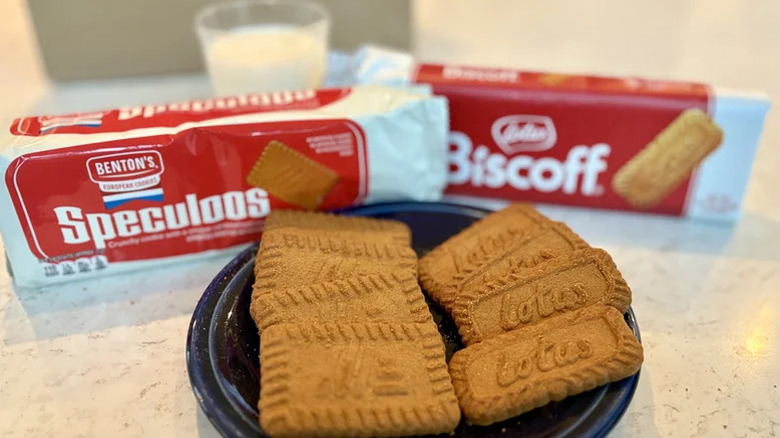 Aldi Speculoos cookies on a plate with packet of them behind it