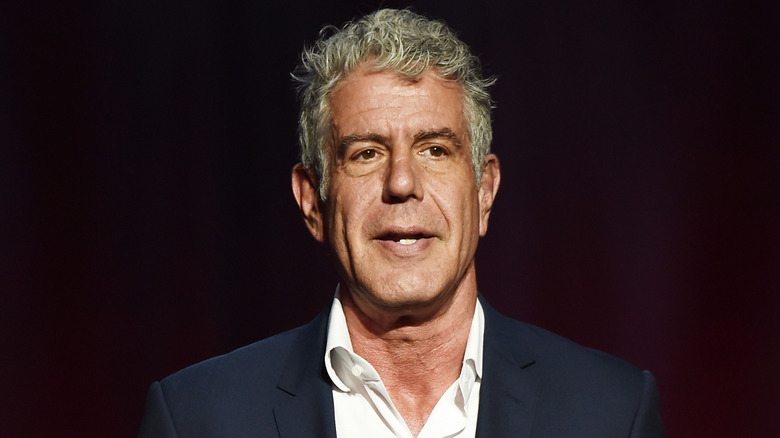 Anthony Bourdain speaking at an event.