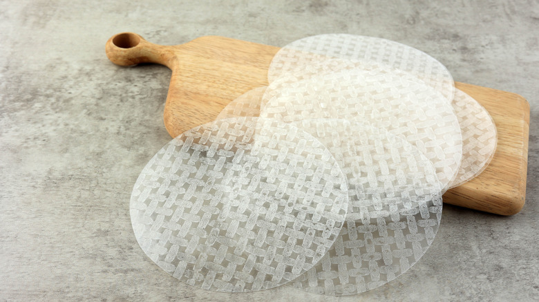 Vietnamese rice paper on a wooden cutting board