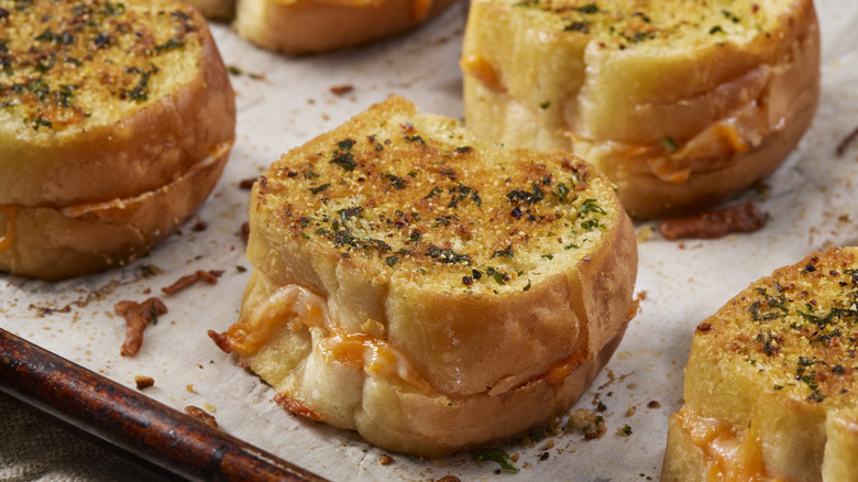 Baked grilled cheese sandwiches made with Hawaiian rolls