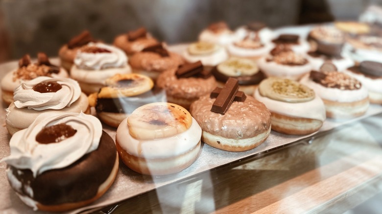Artisanal donuts on display in bakery
