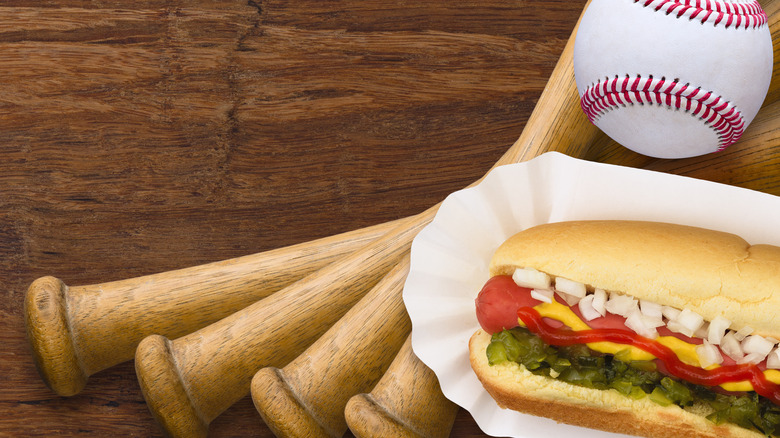 hot dog with baseball bats and baseball
