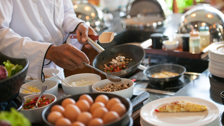 chef cooking in restaurant kitchen
