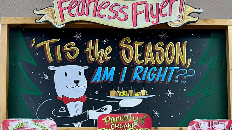 Closeup of Trader Joe's holiday display on a board