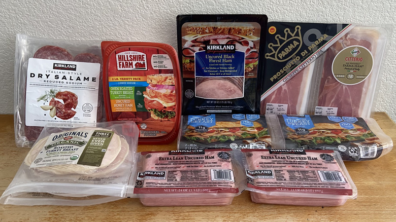 all Costco deli meats neatly arranged on a wooden table