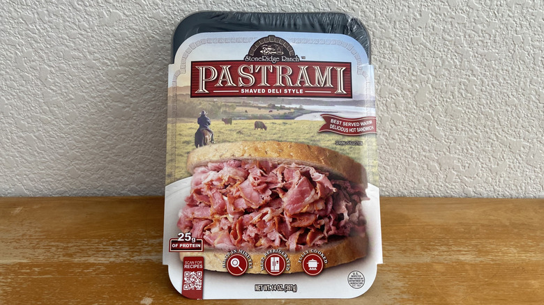Package of StoneRidge Ranch pastrami propped up on a wooden table