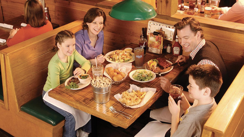 Happy family eating at Texas Roadhouse