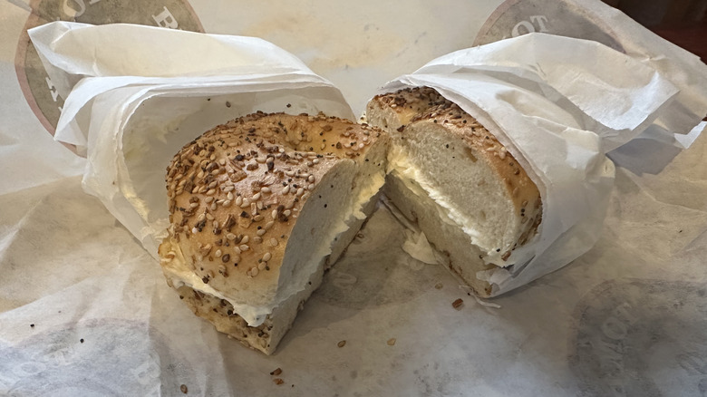 Everything bagel with cream cheese in parchment paper