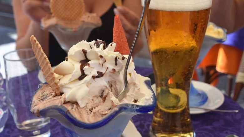 Ice cream dish with glass of beer