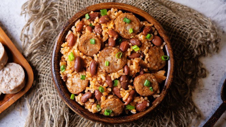 Ceramic dish with sausage, rice, and beans