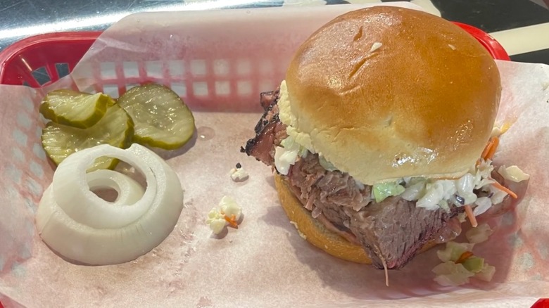 The Big Mike brisket sandwich with onions and pickles on the side from Lil' Mike's Bar-B-Que