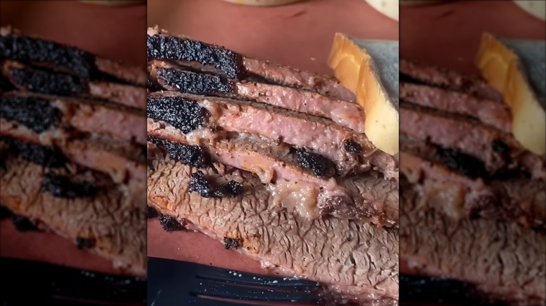 Brisket with side of sliced bread from Lucille's BBQ