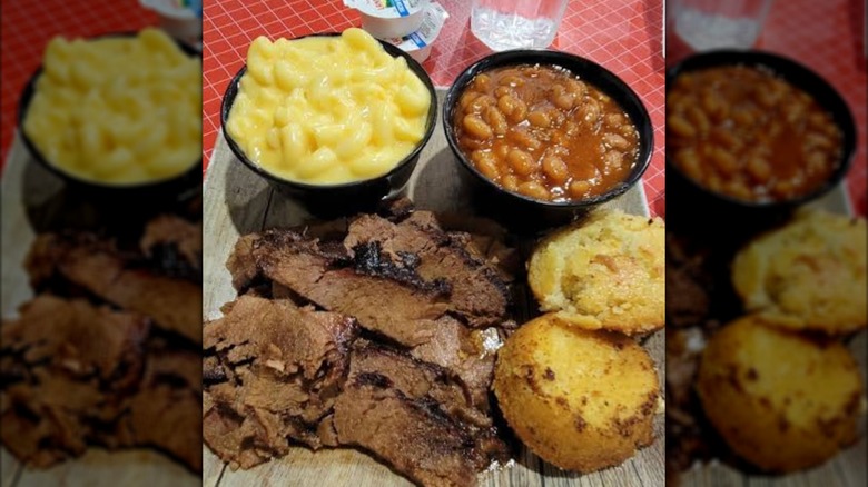 Sliced Brisket with sides of mac and cheese, baked beans, and cornbread from Ole South Bar-B-Q