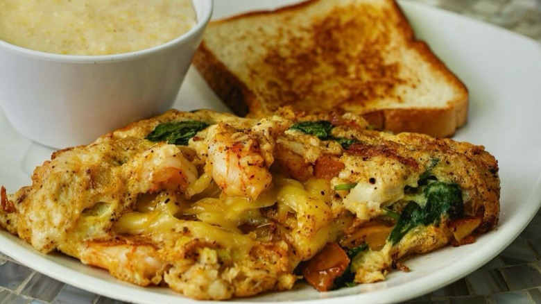 Yo' Mama's restaurant omelet with side of grits and toast