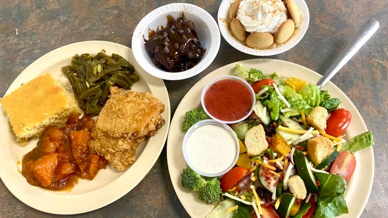various foods, green beans, cornbread,  salad, banana pudding from buffet at Nelson's Barnyard Buffet﻿