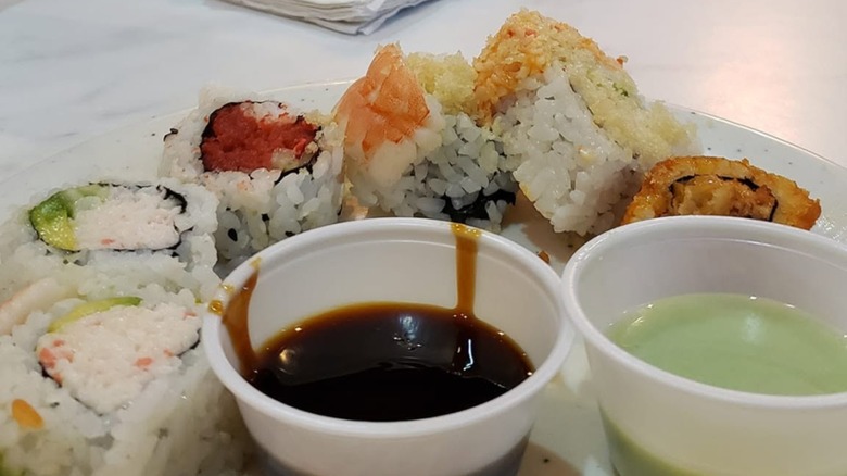 sushi items with dipping sauces from Harbor Seafood Super Buffet