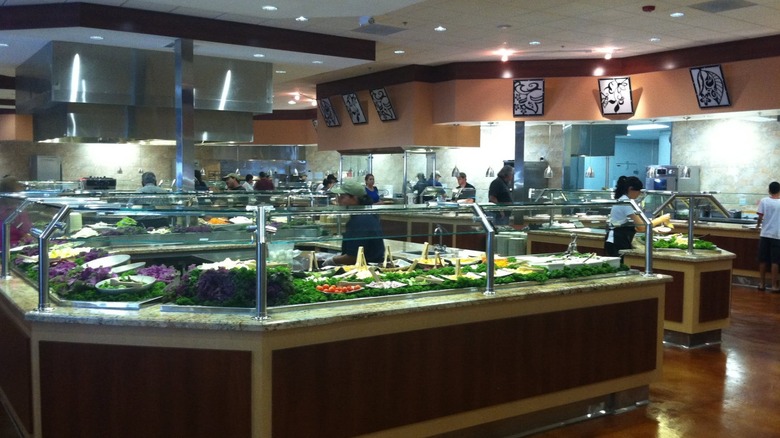 buffet and salad bar setup in dining room at Paradise Buffet