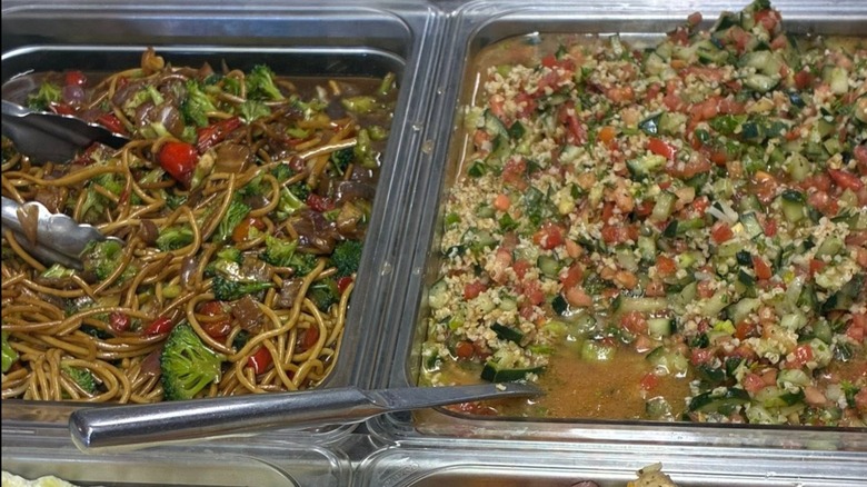 Various items in trays on buffet line at Country Cottage Restaurant