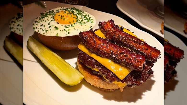 Wagyu burger with bacon, cheese, and fried egg at 4 Charles Prime Rib in NYC