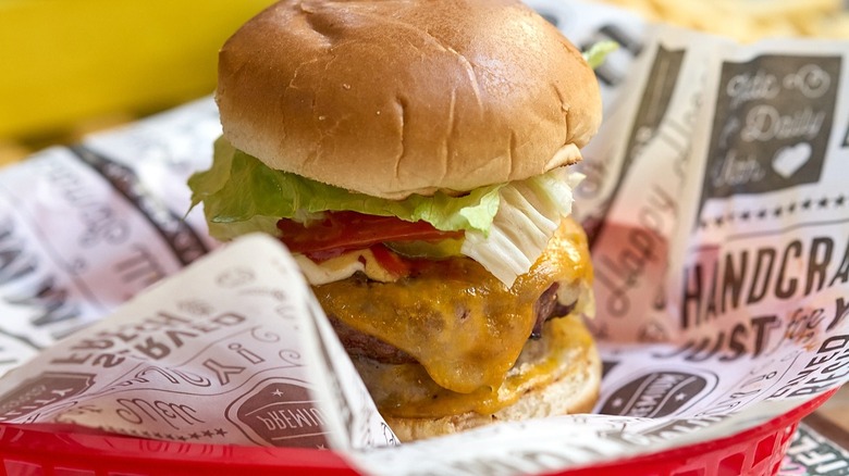 A burger in a basket from Burger Joint in NYC