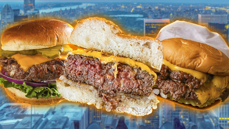 Three burgers with New York City in the background
