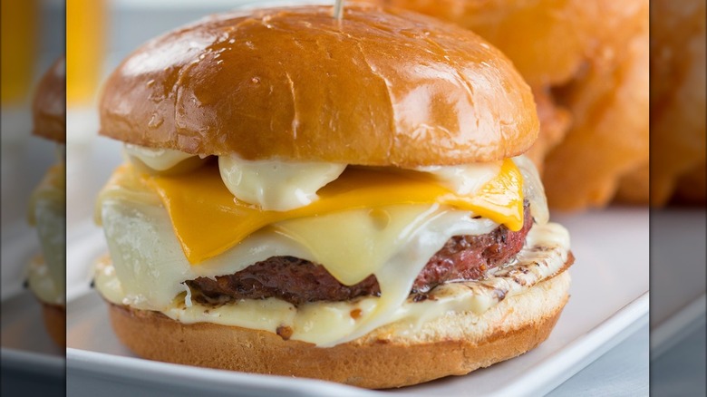 Garlic Three Cheese Burger on a metal tray