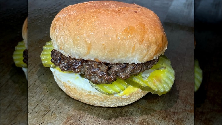 Jumbo No. 3 Dressed Hamburger on a wooden countertop