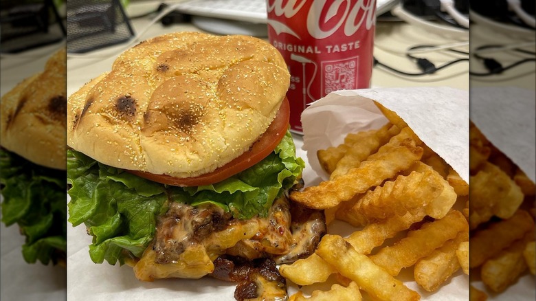 Bulgogi Burger and fries in front of coke can