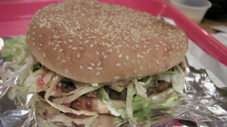 Big Miner Burger on foil on a tray