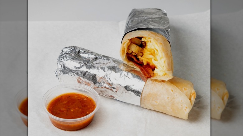 A breakfast burrito and salsa from Guisado's