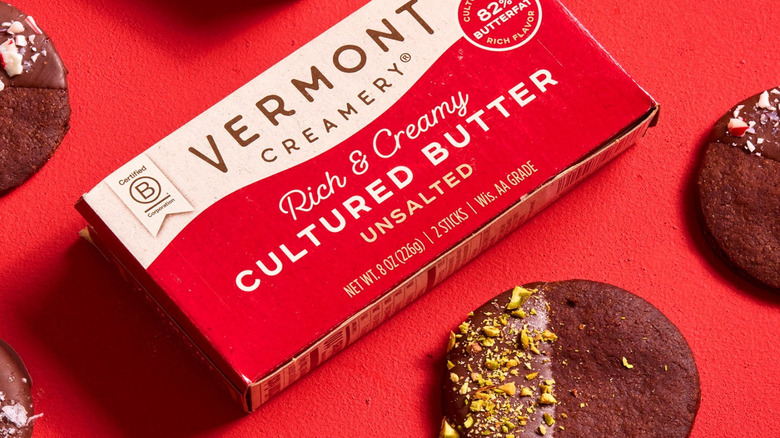 vermont creamery slab on a red background with cookies scattered around