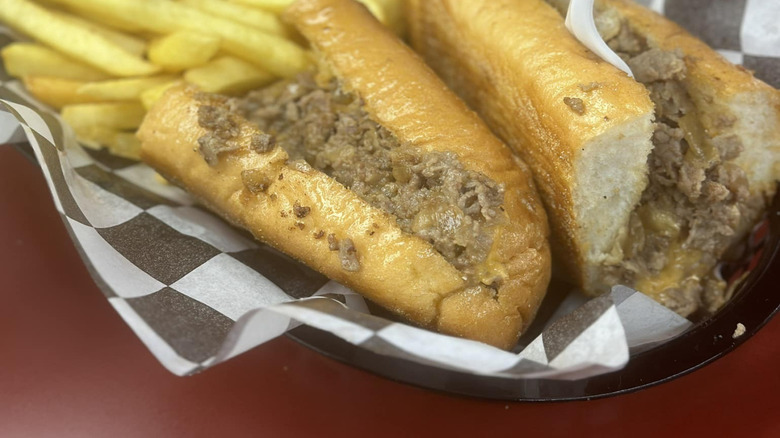 Izzy's Hoagie Shop Cheesesteak, side of fries.